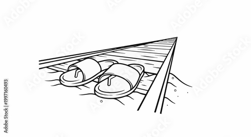 A pair of flip-flops resting on weathered wooden railway tracks