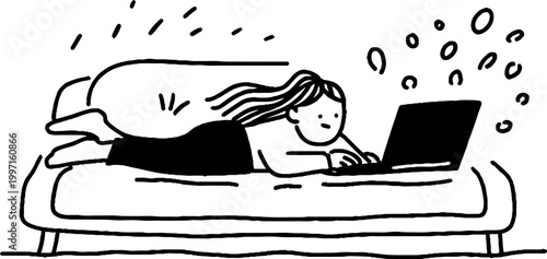 Woman lying on sofa working on laptop at home