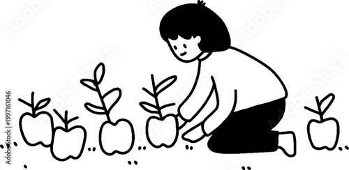 Child kneeling while planting saplings among fruit seedlings