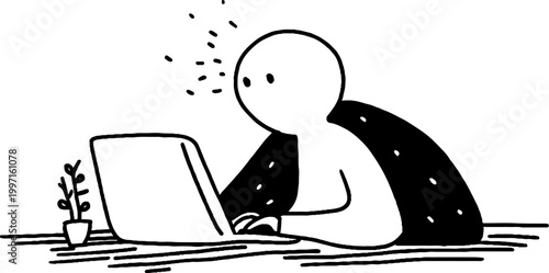 Figure focused typing on laptop at minimalist desk setup