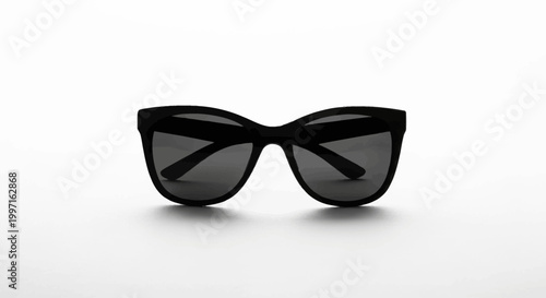 Elegant black sunglasses on a clean white background, studio shot for fashion appeal