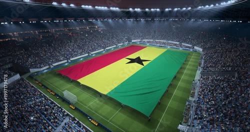 Professional Stadium With Soccer Game Championship With Flag of Ghana Spread Across Pitch Before Football Match Start. Cheering Crowds of Fans at Arena Anthem Ceremony. Aerial Static Wide Shot