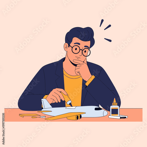 A man carefully assembling an airplane model on a table