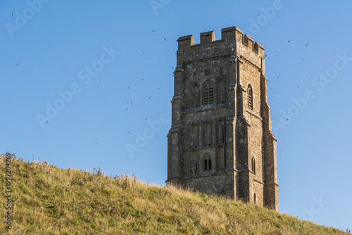 Historic St Michaels Tower on Glastonbury Tor Hill under Clear Blue Sky
