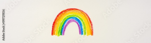 Crayon rainbow drawing centered on plain white background