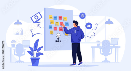 Man planning strategy on sticky notes board in modern office, business idea concept
