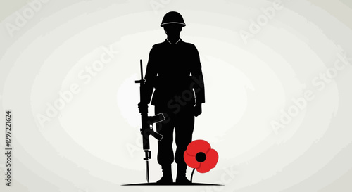 Silhouette of a soldier holding a rifle next to a remembrance poppy.