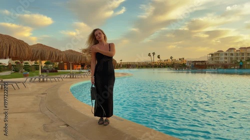 An Independent Traveler Explores Tranquil Surroundings During Peaceful Sunset Walk