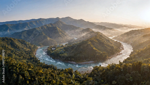 Breathtaking Aerial View of a Crystalline River Winding Through Mountains