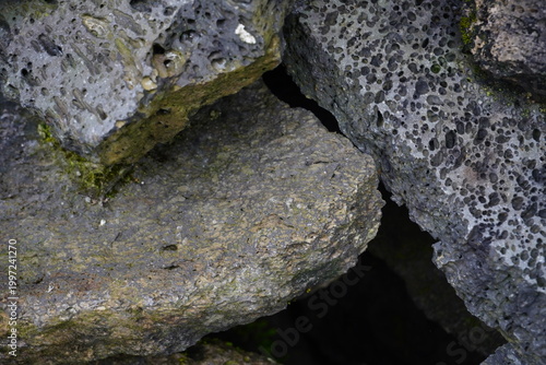 Φωτογραφία Closeup of porous volcanic basalt rocks texture