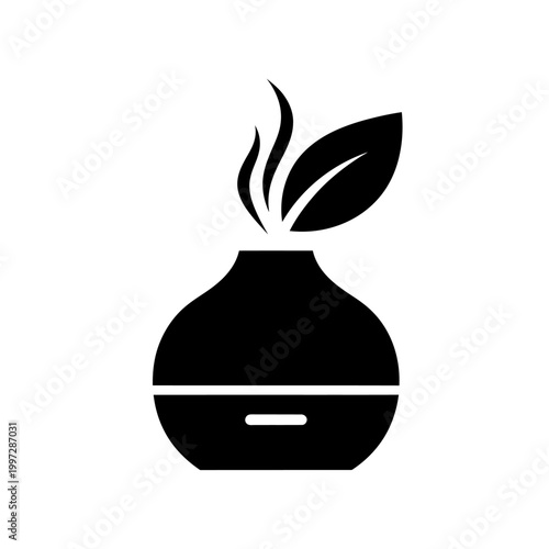 Aromatic diffuser with leaves and steam, representing relaxation and wellness.