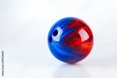 Bright Red and Blue Bowling Ball Placed on a Plain Background Ready for Use