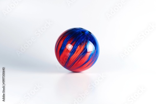 Bright Blue and Red Bowling Ball on a Plain Background With Studio Lighting