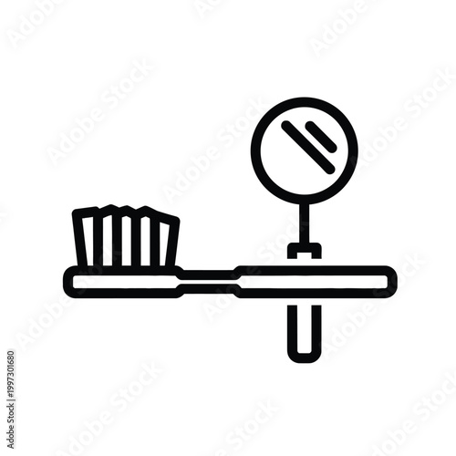 Toothbrush on a bathroom countertop.