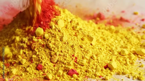 Close Up Macro of Red and Yellow Holi Powder Spilling on a Pile