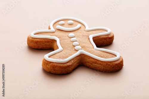 Gingerbread Cookie With Icing Showing a Smile Design on Brown Surface