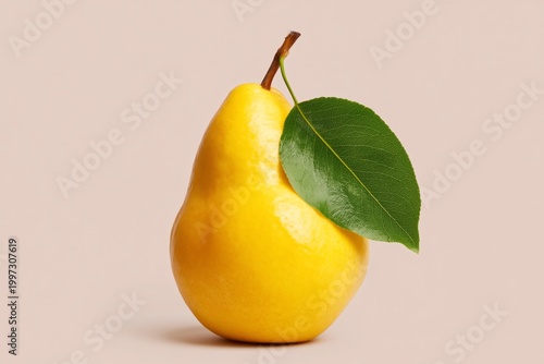 Fresh Pear With Green Leaf on Beige Background in Studio Setting