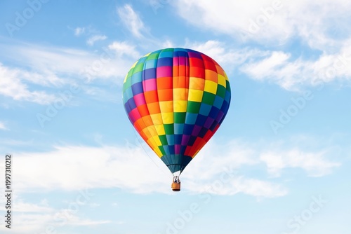 Colorful Hot Air Balloon Flying in the Clear Blue Sky During a Bright Sunny Day