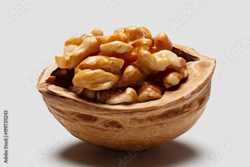 Walnuts in a Shell on a Plain Background Showing Nut Texture and Shell Shape