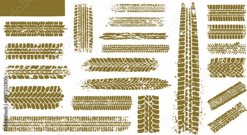 Foto Collection of various tire tread marks and off-road vehicle tracks in gold color