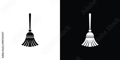 Black and white of two vintage-style desk lamps with white shades black background, white desk lamp