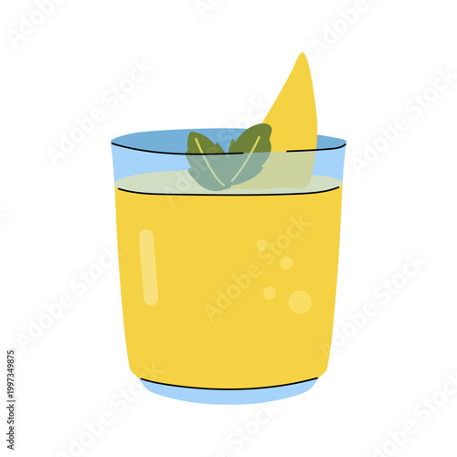 Orange juice glass with mint and lemon garnish