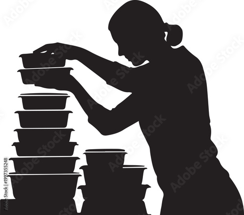 Woman stacking black plastic containers silhouette