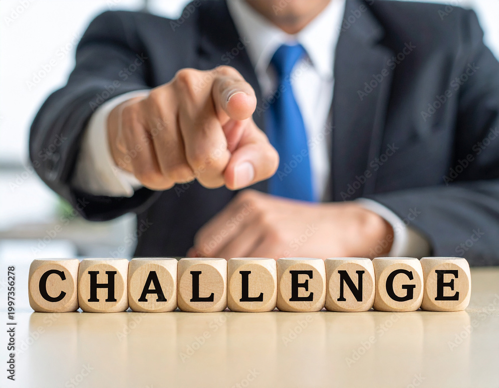 Obraz premium challenge - Geschäftsmann zeigt auf den Text 