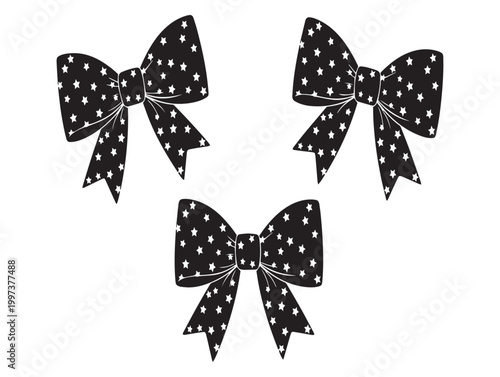 Three black and white polka dot bows isolated on a white background