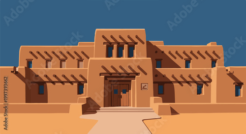 Adobe structure under a clear blue sky, featuring detailed windows and roof beams