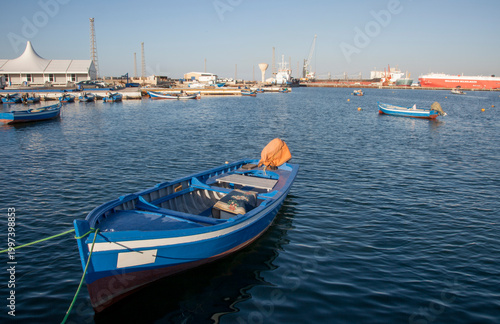 Cuadro en lienzo A small blue fishing vessel in Tripoli harbor, Libya, North Africa