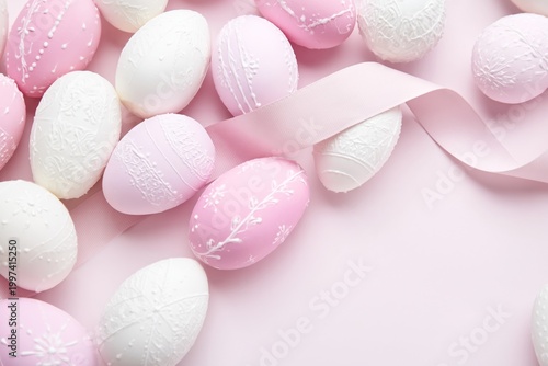 Colorful Decorated Eggs Arranged on a Pink Background With a Ribbon