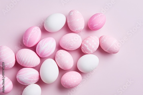 Colorful Decorated Eggs Arranged on a Pink Background With a Ribbon