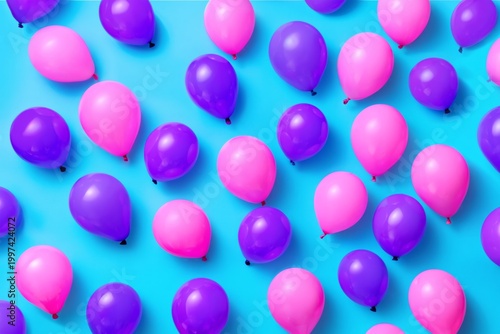 Group of Bright Balloons Arranged on a Blue Background for a Celebration or P...