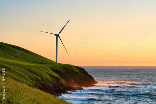 Wind Turbine Stands on a Green Hill Overlooking the Ocean at Sunset Near a Co...
