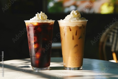 Coffee Drinks Served in Clear Cups at a Cafe in the Afternoon Light