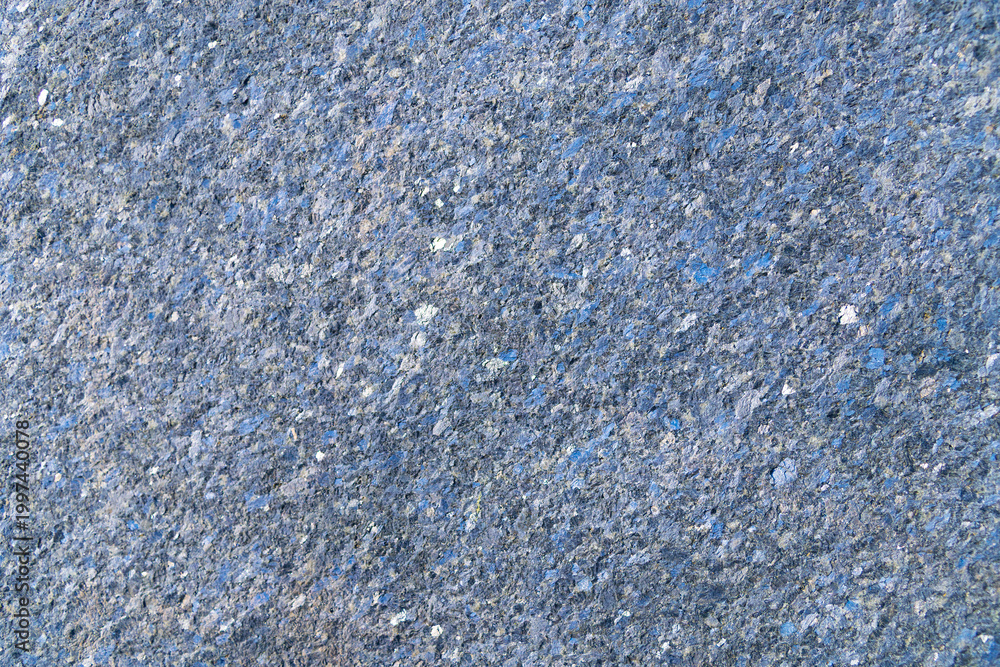 Naklejka premium an uneven, gritty surface with tiny sparkling particles. Rough concrete texture