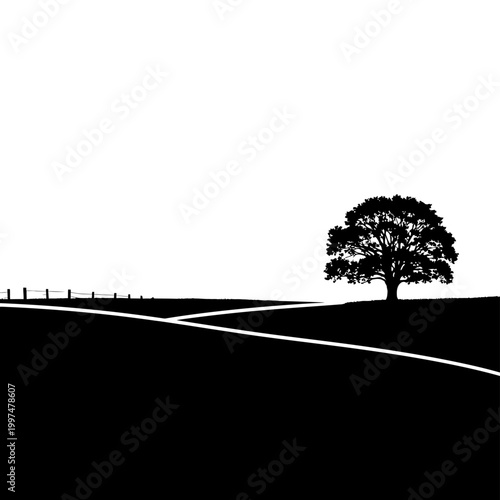 Silhouette of a solitary tree on a rolling landscape with a winding road.