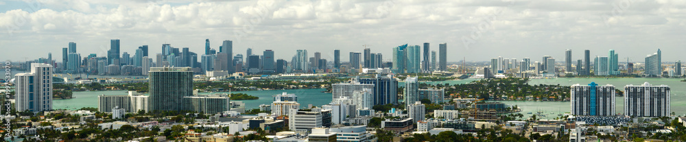 Fototapeta Urban landscape of downtown district of Miami city in Florida, USA. Skyline with high skyscraper buildings in modern american megapolis