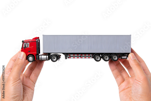 Hands Holding Miniature Cargo Truck on White Background – Logistics and Transportation Concept