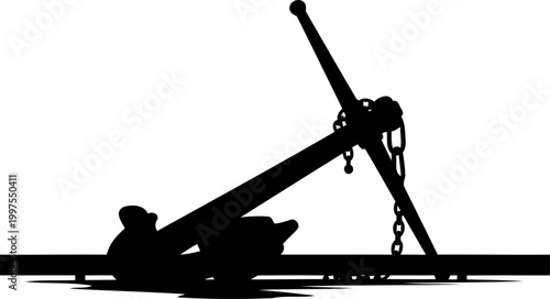 Heavy iron nautical anchor with chain on the ground silhouette