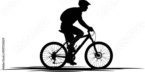 Mountain biker riding a bicycle on a trail silhouette