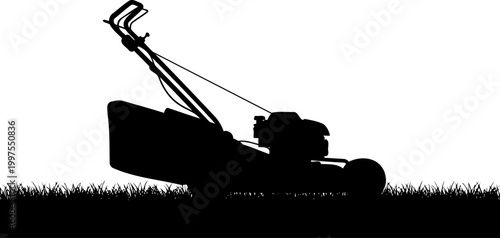Push lawn mower on a manicured grass surface