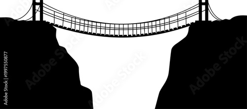 Rope bridge silhouette hanging over a deep canyon gorge