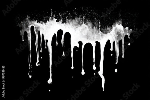 Moody black ink splatter dripping on surface