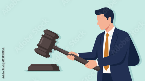 Man in suit holding a gavel. Concept of justice, law, auction, or authority.