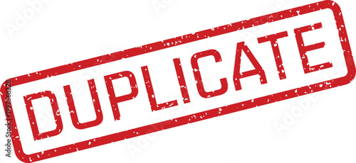 A red distressed rubber stamp with the word DUPLICATE diagonally across a clean white surface