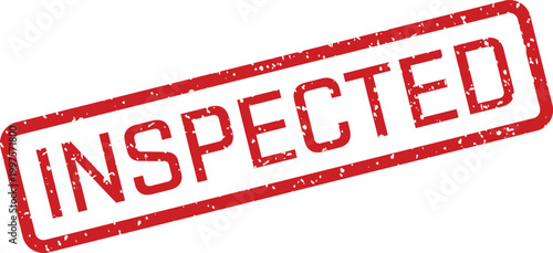 A red rubber stamp with the word INSPECTED clearly visible on a clean white surface