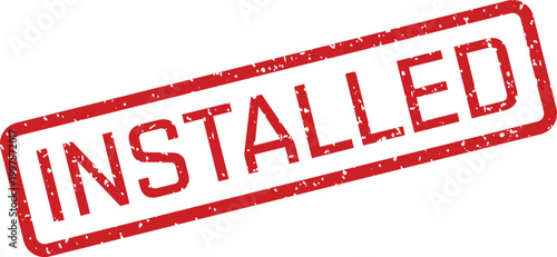 A vibrant red rubber stamp with the word INSTALLED prominently displayed against a pure white background