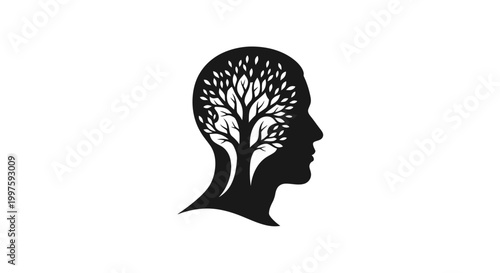Black silhouette of a human head with a tree.